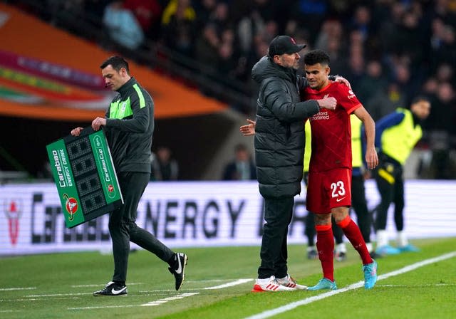 Luis Diaz is hugged by manager Jurgen Klopp 