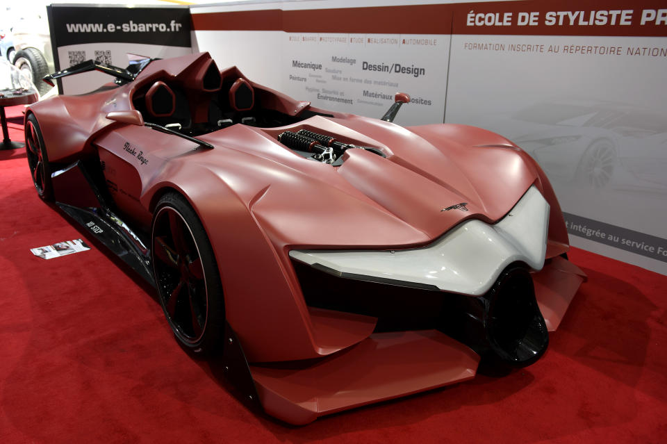 The new concept car Sbarro Fleche Rouge is shown during the press day at the 84th Geneva International Motor Show in Geneva, Switzerland, Wednesday, March 5, 2014. (AP Photo/Keystone, Martial Trezzini)