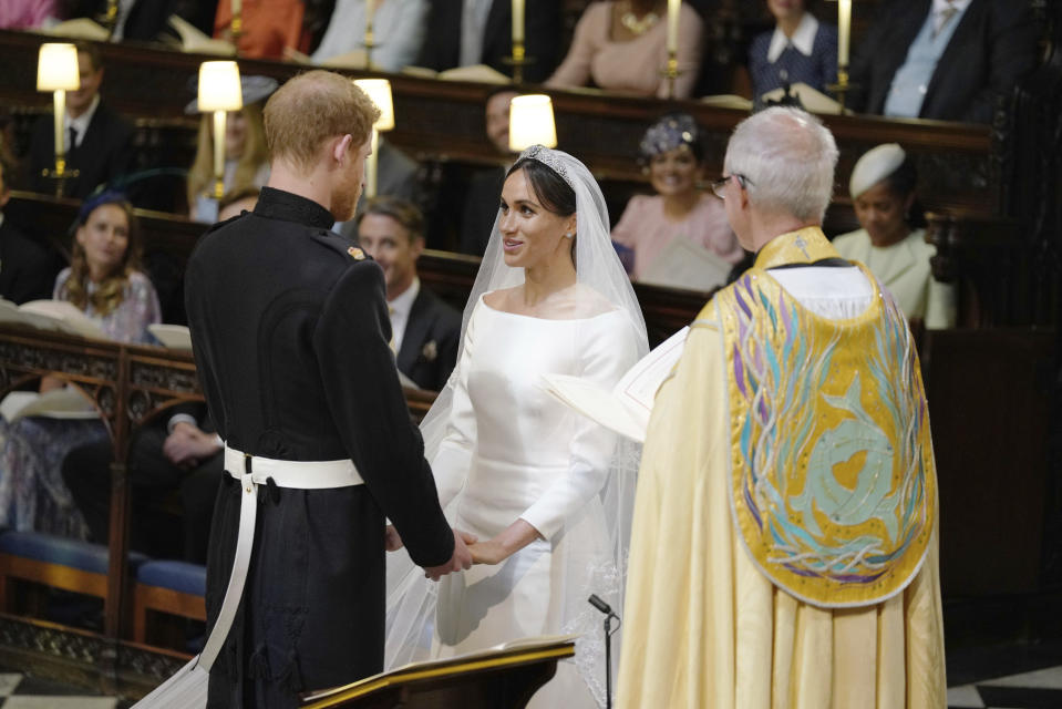 A body language expert said Ms Markle was the strong one in the couple during the ceremony. Source: Dominic Lipinski/pool photo via AP