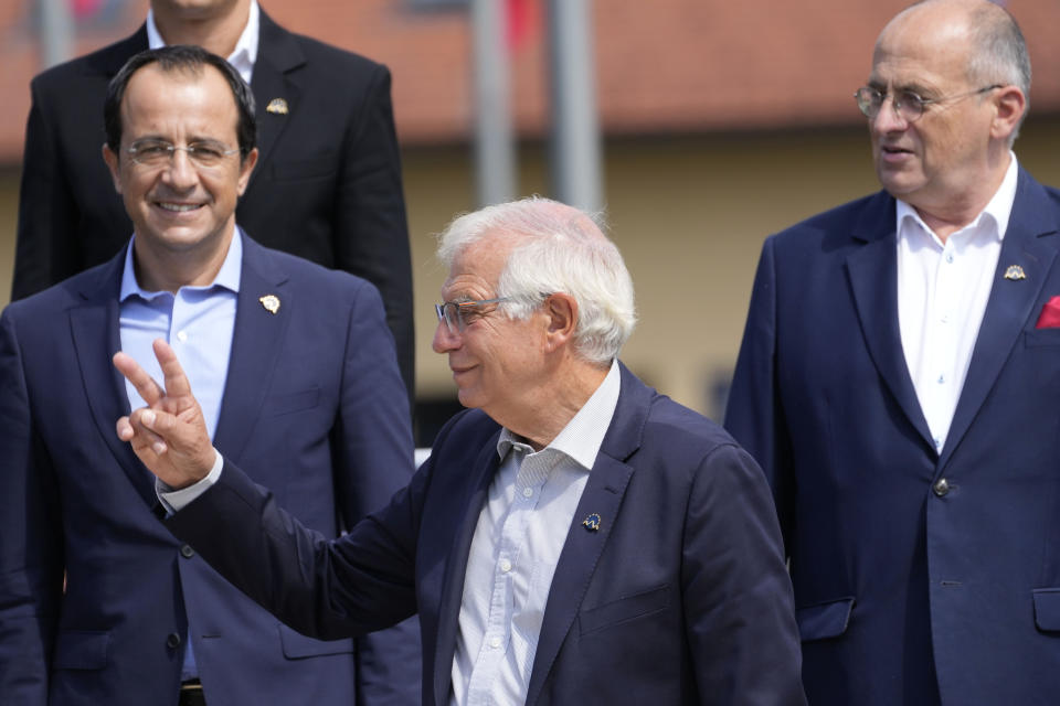 European Union foreign policy chief Josep Borrell, center, gestures at a group photo during a meeting of EU foreign ministers at the Brdo Congress Center in Kranj, Slovenia, Friday, Sept. 3, 2021. European Union officials listed Friday a set of conditions to the Taliban including the respect of human rights and rule of law that should define the level of engagement the 27-nation bloc will develop with the new Afghanistan rulers. (AP Photo/Darko Bandic)