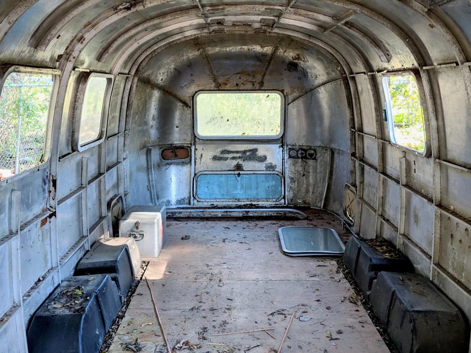 The interior of the 1971 Airstream before it was converted.