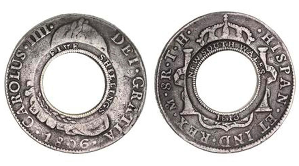 Coin called holey dollar forged from Spanish coins. 