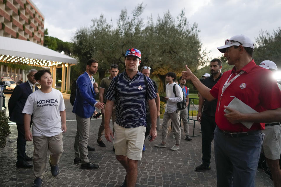 USA Ryder Cup team captain Zach Johnson returns with members of his team at a hotel in Rome, Friday, Sept. 8, 2023, at the end of a practice session at the Marco Simone golf club. (AP Photo/Andrew Medichini)