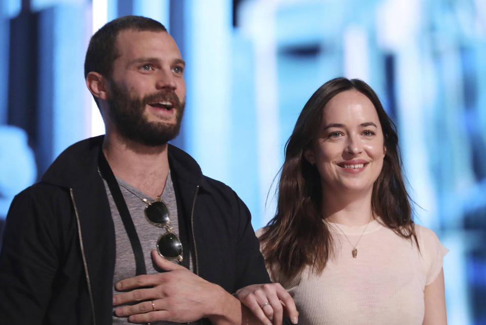 Jamie Dornan, left, and Dakota Johnson are seen during rehearsals for the 89th Academy Awards on Saturday, Feb. 25, 2017. The Academy Awards will be held at the Dolby Theatre on Sunday, Feb. 26. (Photo by Matt Sayles/Invision/AP)