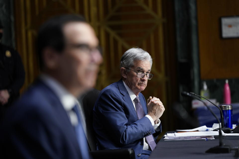 Chairman of the Federal Reserve Jerome Powell and Treasury Secretary Steven Mnuchin testify during a Senate Banking Committee hearing on 'The Quarterly CARES Act Report to Congress' on Capitol Hill in Washington, Tuesday, Dec. 1, 2020. (AP Photo/Susan Walsh, Pool)