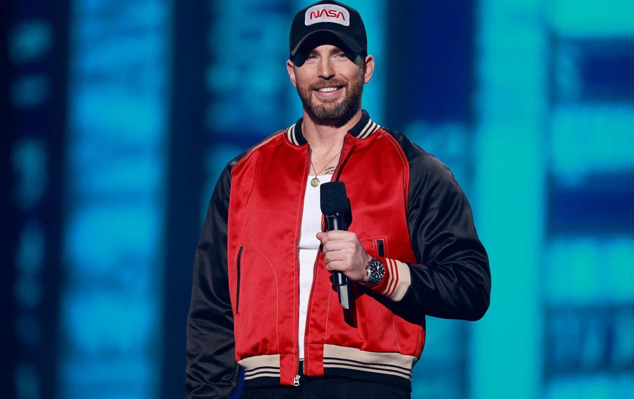 US actor Chris Evans speaks on stage during the MTV Movie and TV Awards at the Barker Hangar in Santa Monica, California, June 5, 2022. (Photo by Michael TRAN / AFP) (Photo by MICHAEL TRAN/AFP via Getty Images)