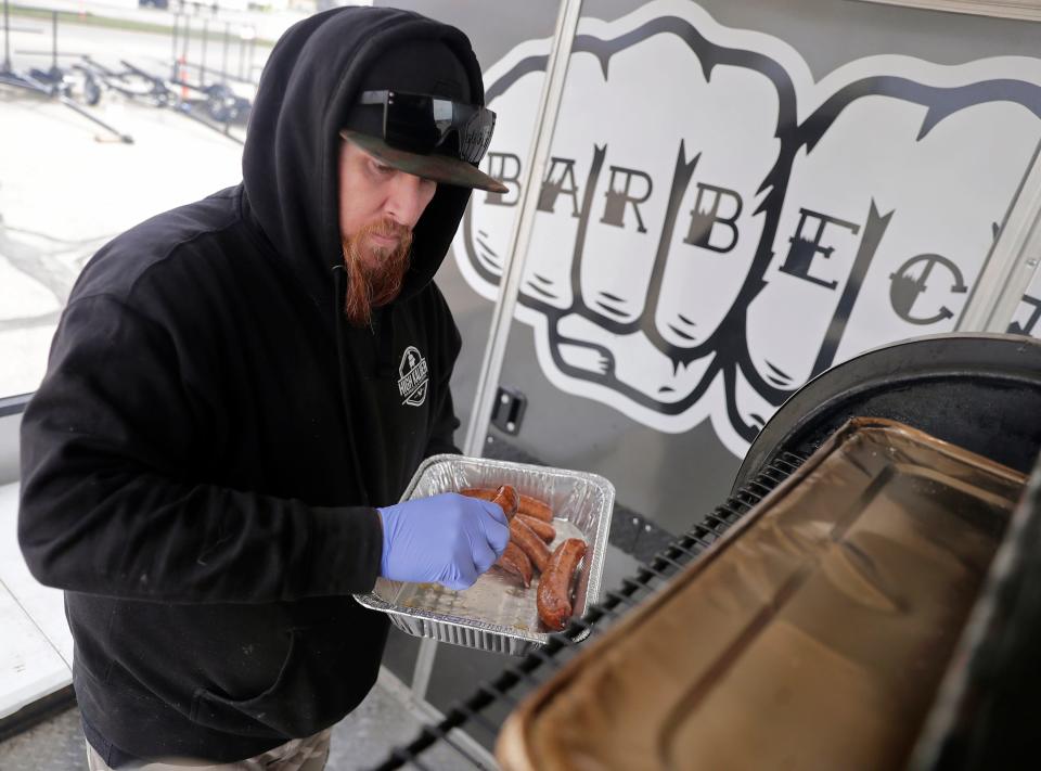 Owner Dustin Johnson places Texas Jalapeno Cheddar links into a smoker whilw working in his food truck High Kaliber on Friday, April 26, 2024 in Appleton, Wis.
Wm. Glasheen USA TODAY NETWORK-Wisconsin

Seventh grade teacher Chia Lee at Wilson Middle School