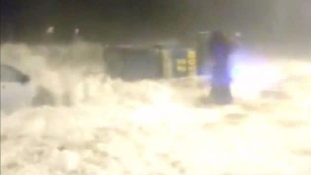 This is the moment the vehicle is completely flipped on its side by a massive wave in Chile. Photo: YouTube