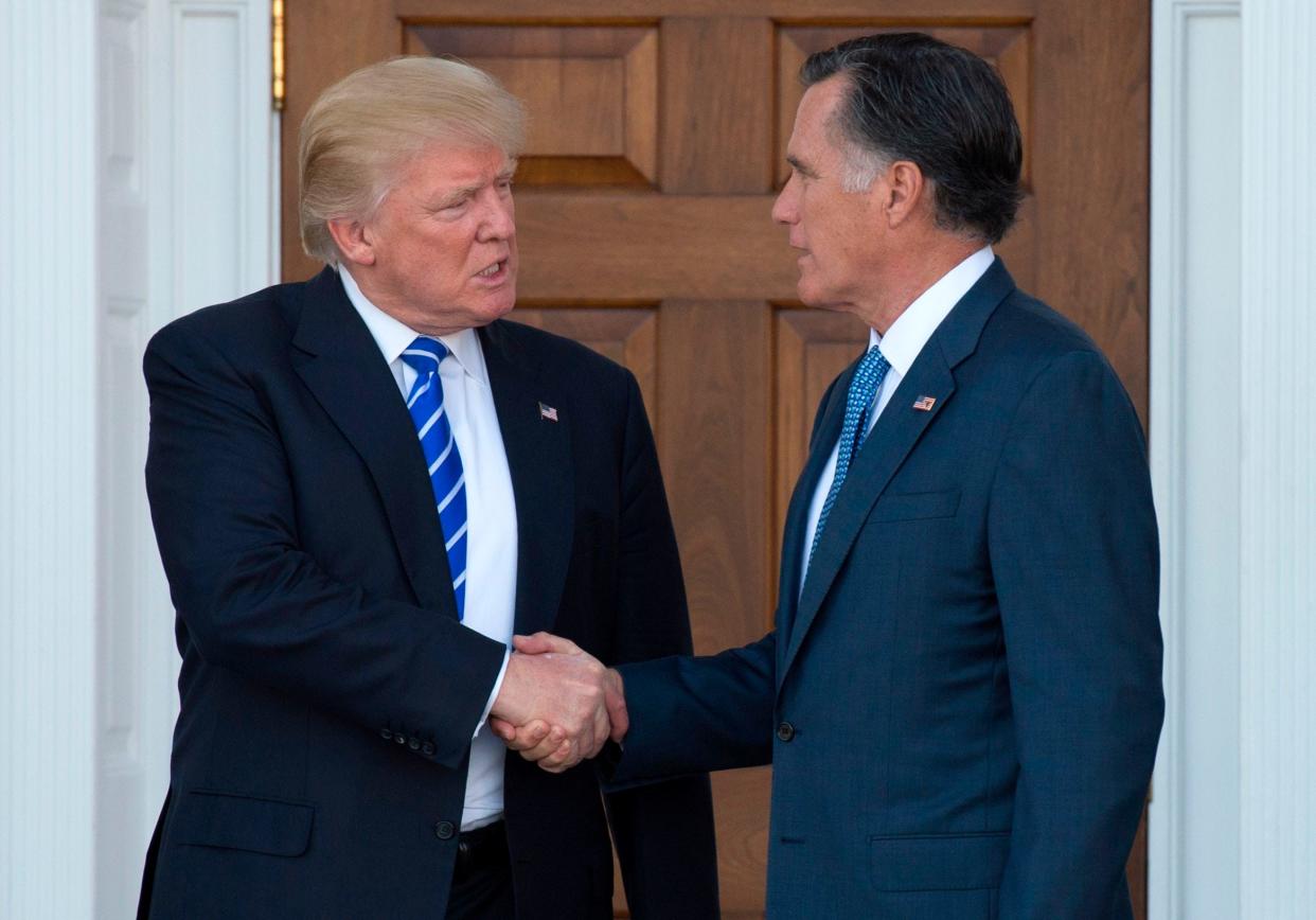 Donald Trump and Mitt Romney in November of 2016.