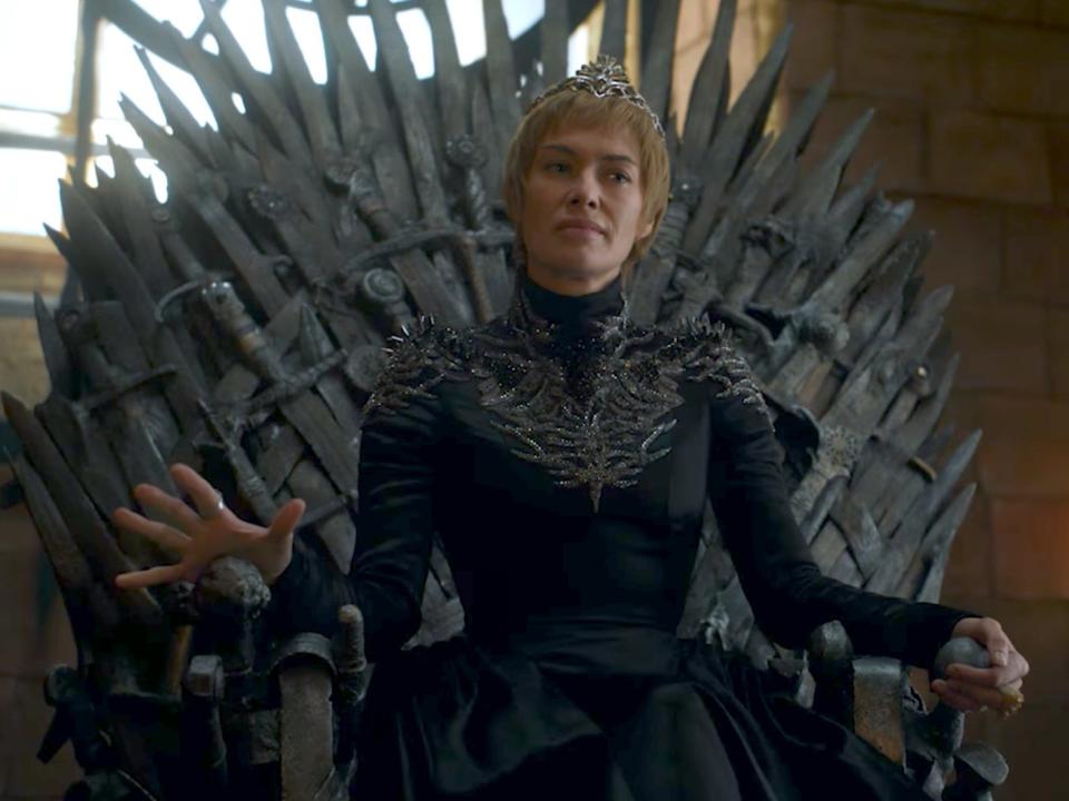 Cersei Lannister sitting on iron throne