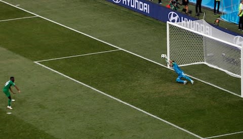 Saudi Arabia's Fahad Almuwallad, left, watches his penalty saved by Egypt goalkeeper Essam El Hadary  - Credit: AP Photo/Themba Hadebe