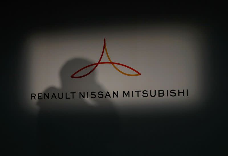 Renault, Nissan and Mitsubishi chiefs hold a news conference in Yokohama