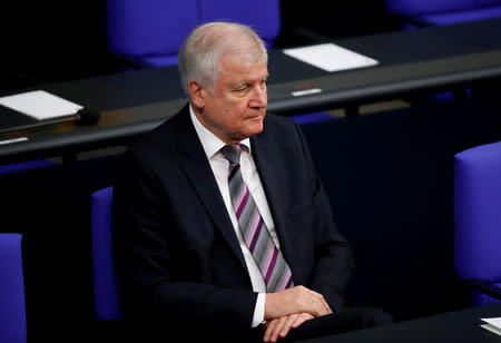FILE PHOTO: German Interior Minister Horst Seehofer is seen before German President Frank-Walter Steinmeier's commemorative speech at Berlin's Reichstag to mark the 100th anniversary of the Weimar Republic, in Berlin, Germany, November 9, 2018. REUTERS/Axel Schmidt/File photo