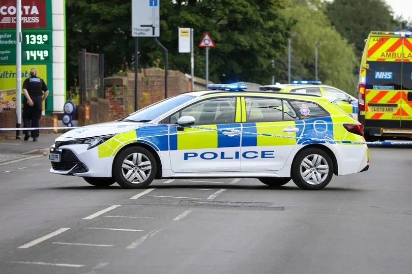 Police at the scene of the collision