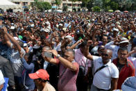 Madagascar demonstrators from the opposition chant slogans as they protest after the president denounced unrest in which two people were killed as a "coup" intended to divide the country's people in Antananarivo, Madagascar April 23, 2018. REUTERS/Clarel Faniry Rasoanaivo