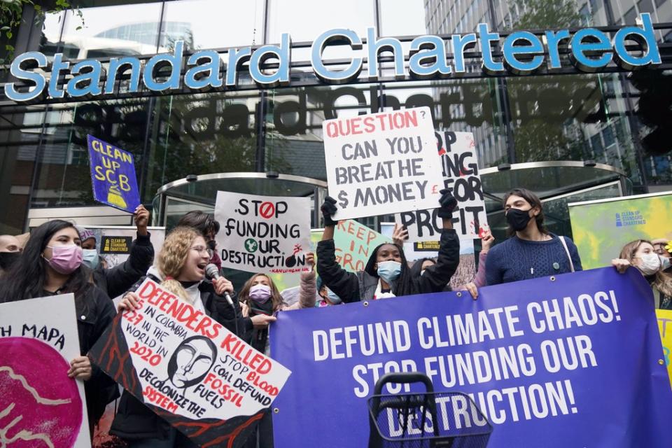 Activists outside Standard Chartered in London (Victoria Jones/PA) (PA Wire)