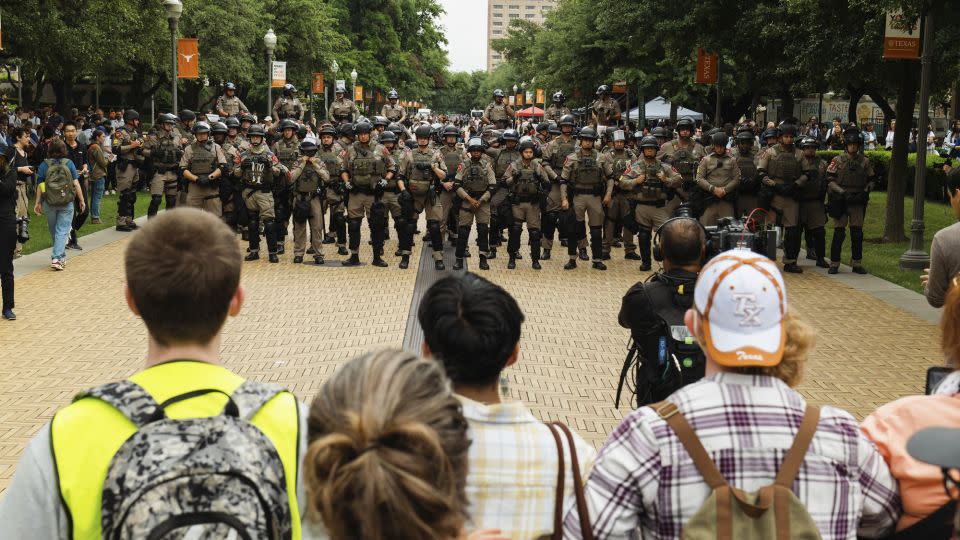 Pro-Palestinian demonstrators face off Wednesday with state officers at the University of Texas at Austin. - Jordan Vonderhaar/Bloomberg/Getty Images