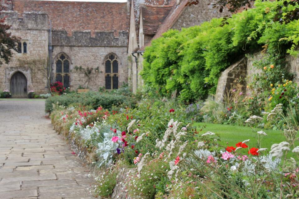 Colorful flowers growing in the green areas dotted around Lympne Castle.