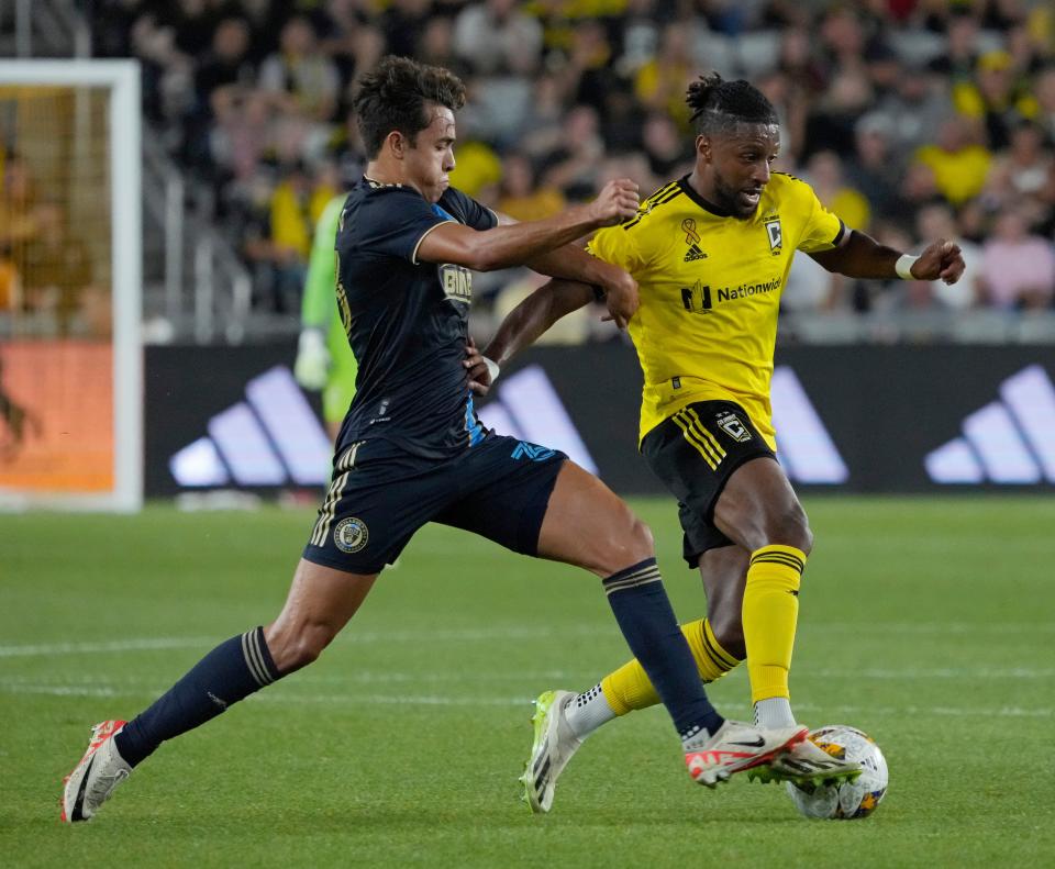 Sept. 30, 2023; Columbus, Oh., USA; 
Columbus Crew defender Steven Moreira (31) is defended by Philadelphia Union midfielder Quinn Sullivan (33) during the first half of Saturday's match at Lower.com Field in Columbus.