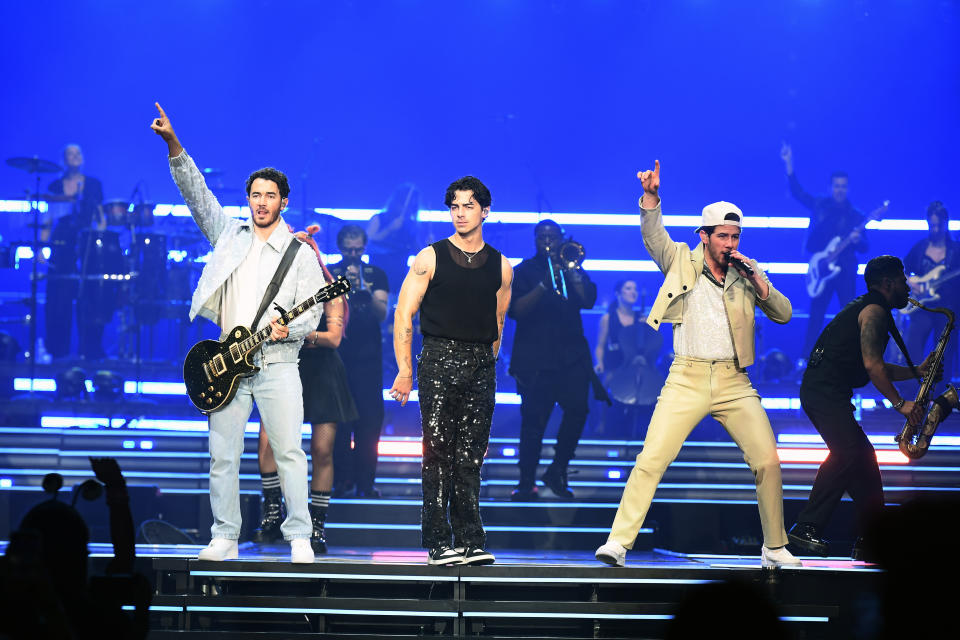 LAS VEGAS, NEVADA - SEPTEMBER 08: (L-R) Kevin Jonas, Joe Jonas and Nick Jonas of Jonas Brothers perform during a stop of the group's Five Albums. One Night. The World Tour. at MGM Grand Garden Arena on September 08, 2023 in Las Vegas, Nevada. (Photo by Bryan Steffy/Getty Images)