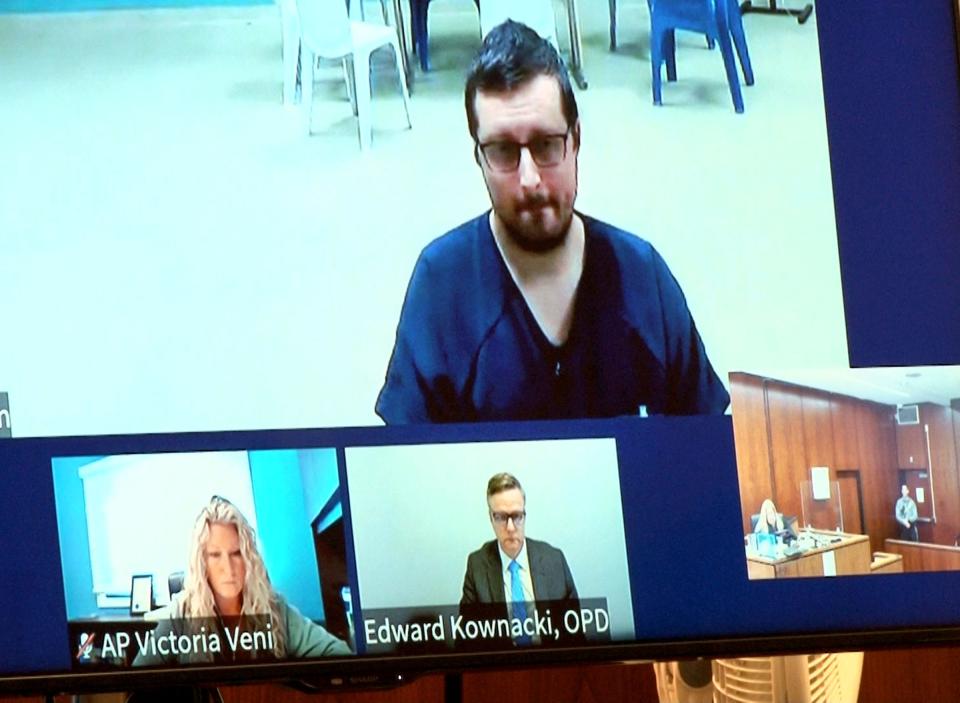 Andrew Fantasia, a Jackson teacher accused of sex crimes, is shown via video link from the Ocean County Jail during his detention hearing before Superior Court Judge Rochelle Gizinski at the Ocean County Courthouse in Toms River Friday, November 3, 2023. Below him are Ocean County Assistant Prosecutor Victoria Veni and his defense attorney Edward Kownacki.