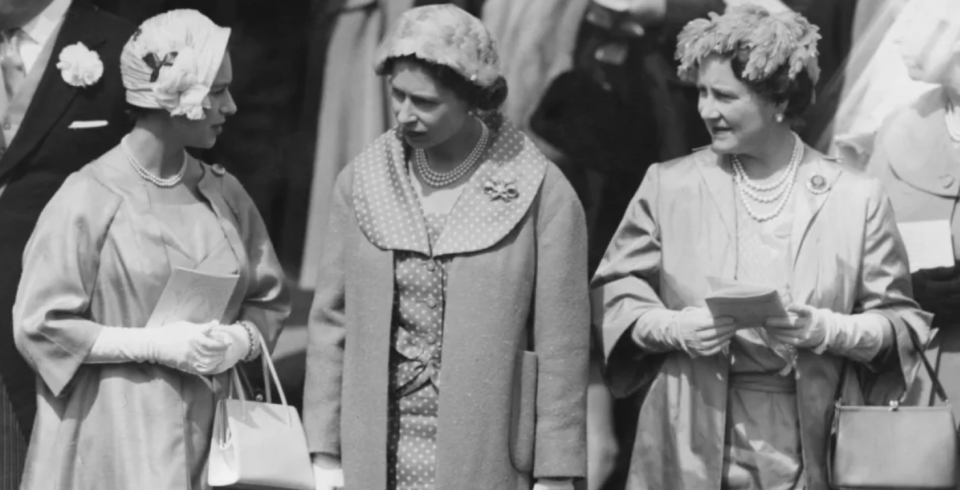 (L-R) Princess Margaret, Queen Elizabeth II and the Queen Mother in June 1958. (Photo via Fox Photos/Hulton Archive/Getty)