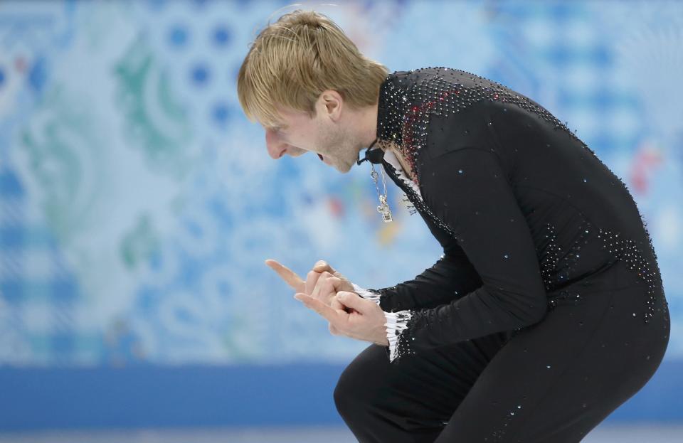 Evgeny Plyushchenko of Russia celebrates during the Team Men Short Program at the Sochi 2014 Winter Olympics