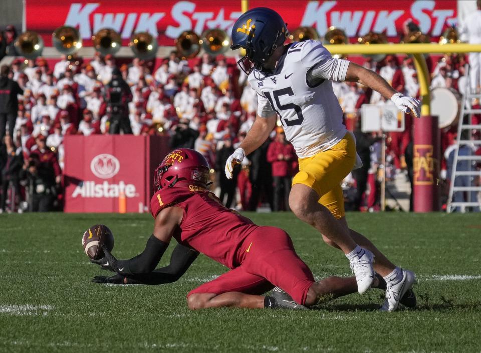 Iowa State defensive back Anthony Johnson, Jr., (1) intercepts a pass intended for West Virginia's Reese Smith (15) in the second quarter during a NCAA football game at Jack Trice Stadium in Ames on Saturday, Nov. 5, 2022.
