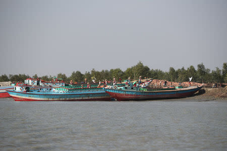 Ferries that carry construction materials at Vashan Char, previously known as Thengar Char island, in the Bay of Bengal, Bangladesh February 14, 2018. Picture taken February 14, 2018. REUTERS/Stringer