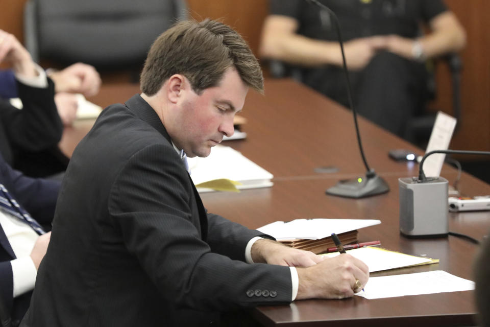 Lawyer for the state of South Carolina Grayson Lambert takes notes during arguments on how do define "heartbeat" under the state's 2023 abortion law on Thursday, May 2, 2024, in Columbia, S.C. (AP Photo/Jeffrey Collins)