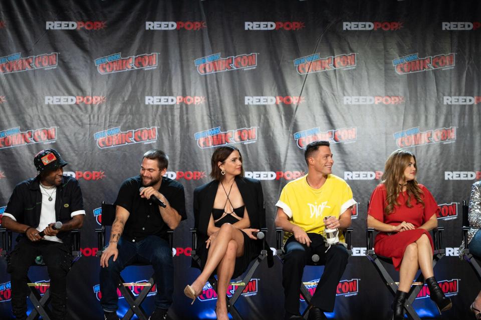 Khylin Rhambo, Dylan Sprayberry, Shelley Hennig, Colton Haynes, and Holland Roden on stage at the panel for "Teen Wolf: The Movie" at New York Comic Con 2022.
