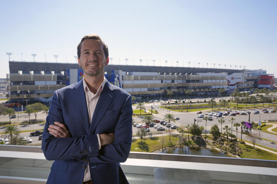 Ben Kennedy, NASCAR Senior Vice President of Racing Development and Strategy for NASCAR at his offices overlooking Daytona International Speedway, Friday, Jan. 27, 2023, in Daytona Beach, Fla. (AP Photo/John Raoux)