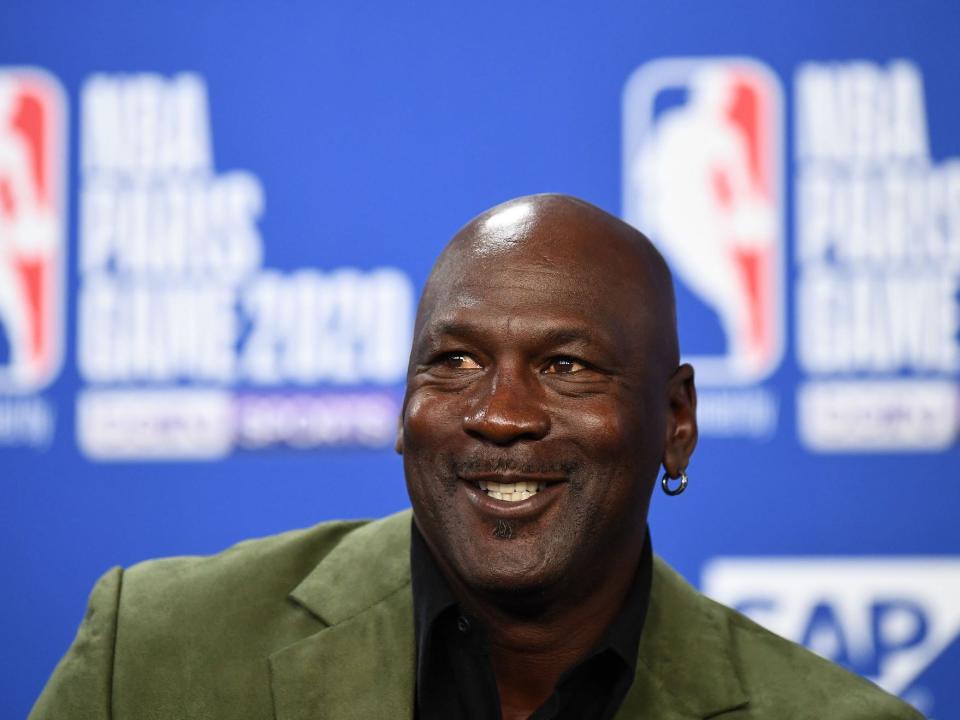 Michael Jordan smiles at a press conference in 2020.