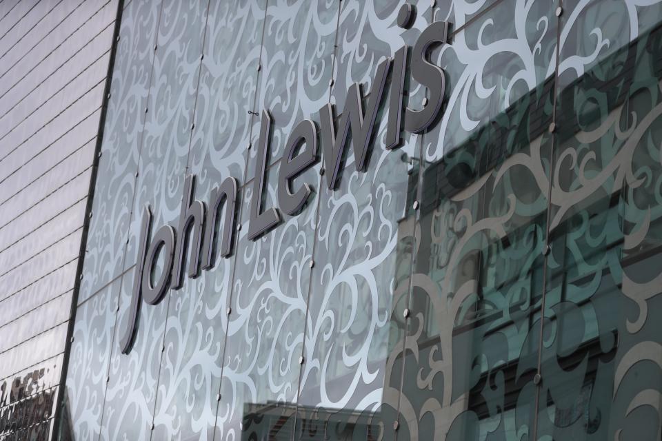 <p>John Lewis</p> (PA Archive)