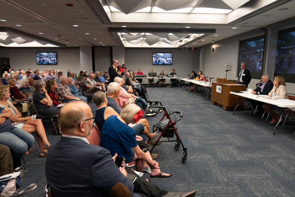 Representatives from the Kansas Corporation Commission heard from Topeka area residents about Evergy's proposed electric rate increase during a public hearing at Washburn Tech in July.