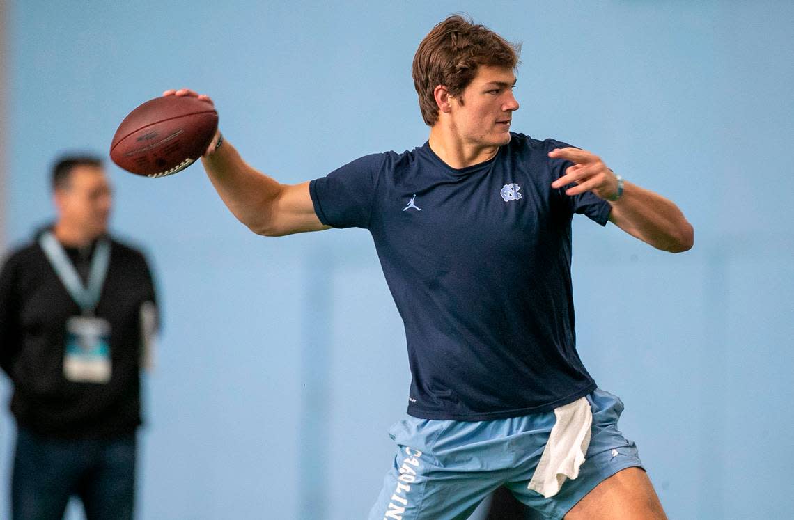 North Carolina quarterback Drake Maye passes to NFL prospects Josh Downs, and Antoine Green during the NFL Pro Day on Monday, March 27, 2023 in Chapel Hill, N.C.