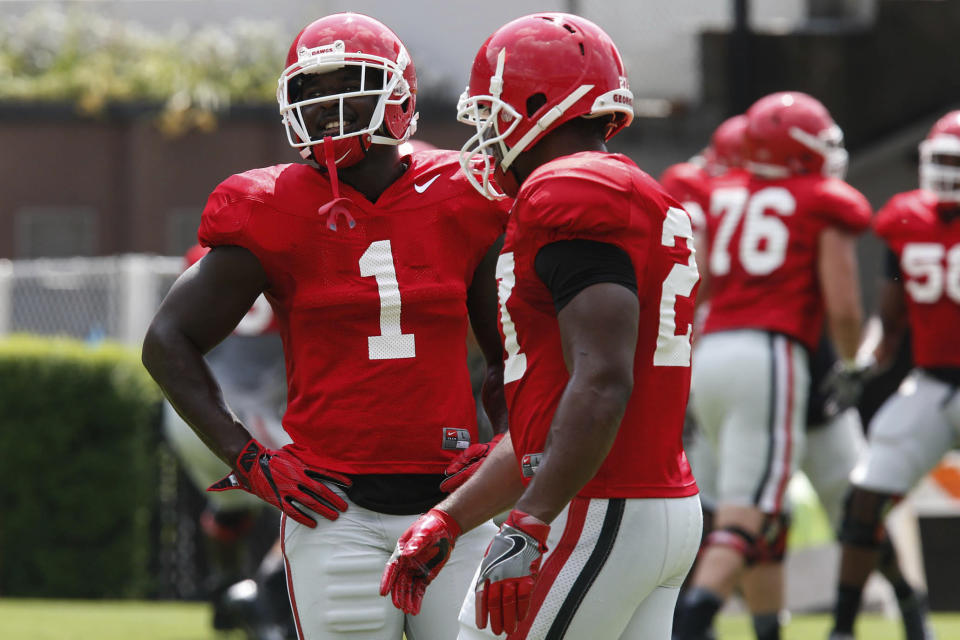 Georgia tailbacks Sony Michel (L) and Nick Chubb (R) have combined for 5,835 rushing yards in three seasons. (AP)