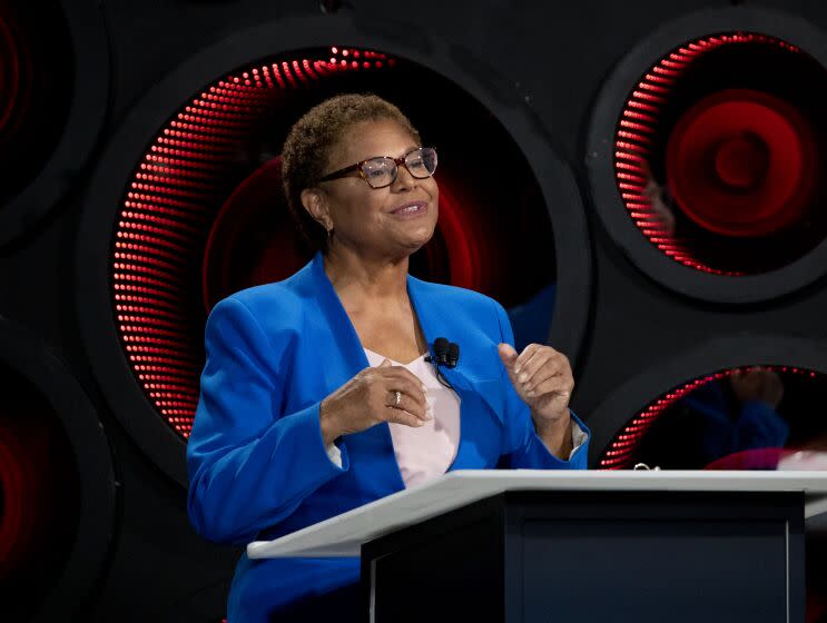 Los Angeles, CA - October 06: Los Angeles Mayoral candidate builder Rick Caruso, not pictured, listens to Congresswoman Karen Bass speak as they participate in the second one-on-one mayoral debate at the KNX Newsradio SoundSpace Stage in Los Angeles, Thursday, Oct. 6, 2022. (Allen J. Schaben / Los Angeles Times)