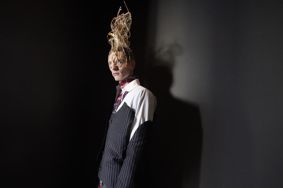 A model is seen backstage ahead of the Thom Browne collection presentation during Fashion Week, Tuesday, Feb. 14, 2023, in New York. (AP Photo/Mary Altaffer)