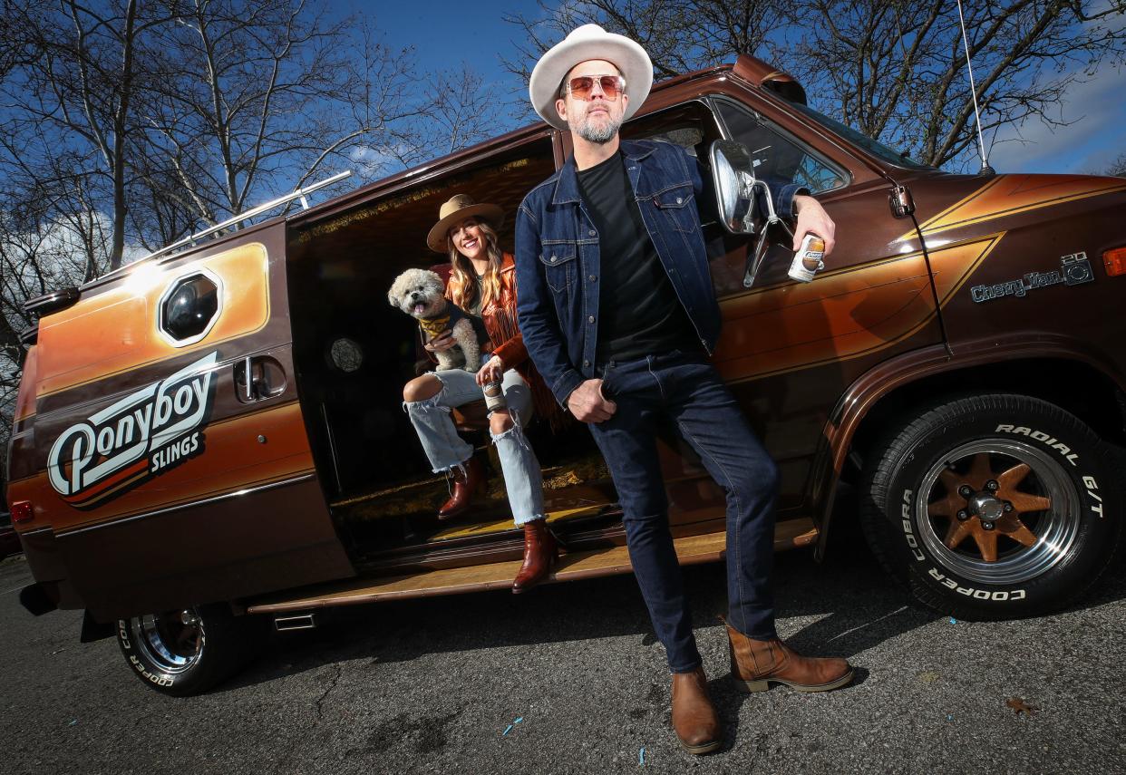 Ponyboy Slings is Louisville-based bourbon cocktail in a can company launched in 2023 by husband-and-wife team Mike and Janell Bass. They've created a 1970s-themed brand, complete with a 1977 van used for events. Their dog is Whiskey. March 4, 2024