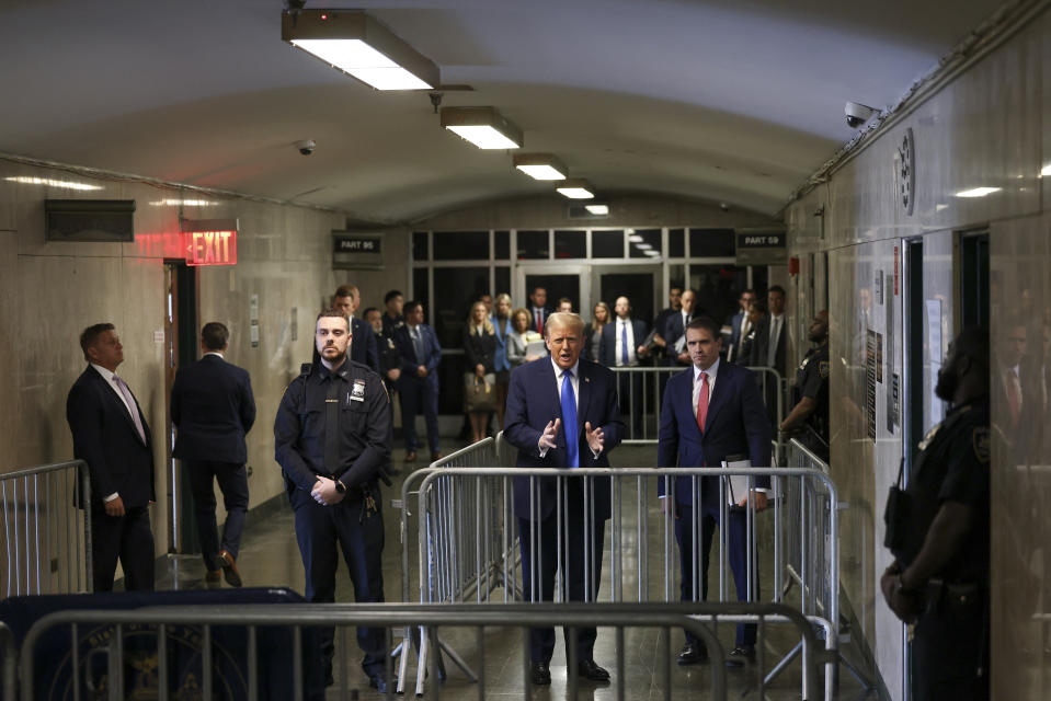 Former president Donald Trump speaks after leaving the courtroom at Manhattan criminal court, Monday, April 22, 2024, in New York. Opening statements in Donald Trump's historic hush money trial are set to begin. Trump is accused of falsifying internal business records as part of an alleged scheme to bury stories he thought might hurt his presidential campaign in 2016. (AP Photo/Yuki Iwamura, Pool)