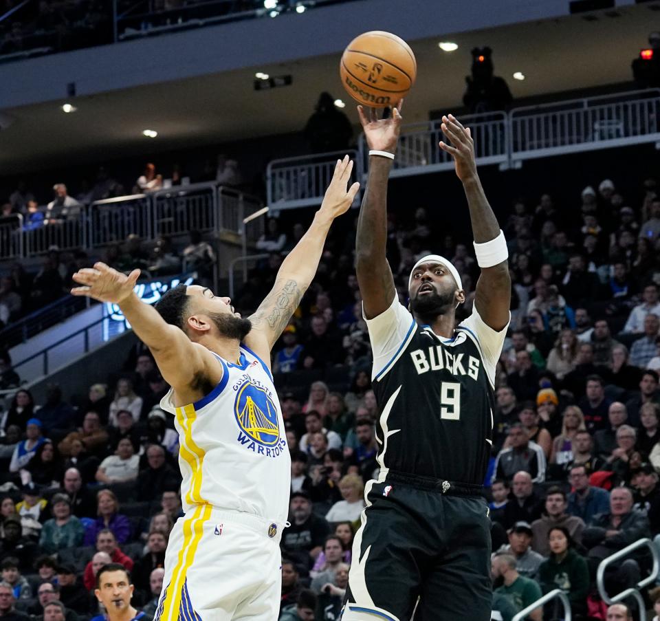 Bucks forward Bobby Portis scores during a game against the Golden State Warriors on Jan. 13 at Fiserv Forum.