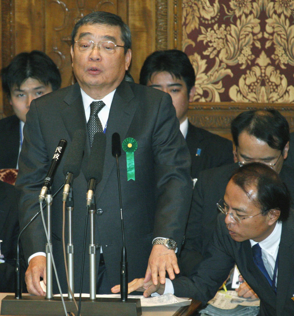 In this Wednesday, Feb. 5, 2014 photo, Japan's public broadcaster NHK President Katsuto Momii speaks during a budget committee question and answer at the lower house of Parliament in Tokyo. Prime Minister Shinzo Abe’s appointment of new board members at Japan’s public broadcaster NHK has invited skepticism among many people that his motive may be to use the news giant to promote his nationalist agenda. Sure enough, minutes of a recent NHK governing board meeting suggest they were trying to exercise influence over programs. (AP Photo/Kyodo News) JAPAN OUT, MANDATORY CREDIT