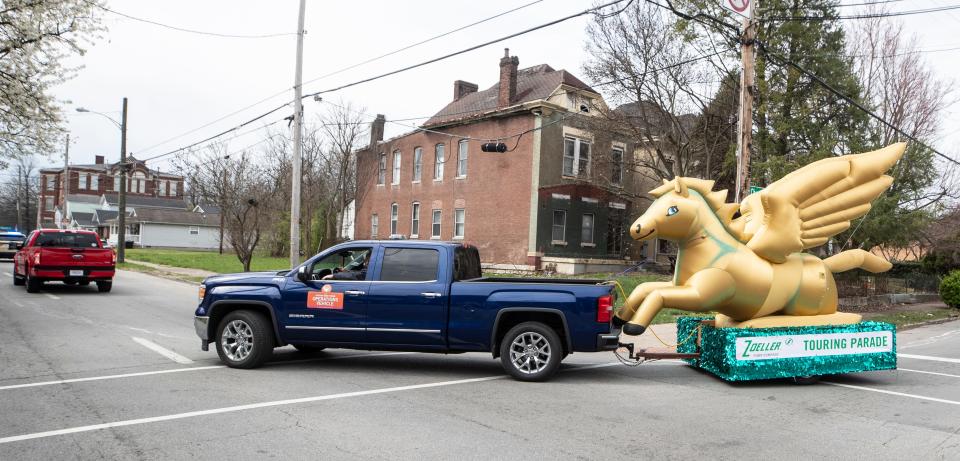 An inflated Pegasus float turned onto 22nd Street in west Louisville as the Kentucky Derby Zoeller Pump Touring Parade rolled through town. April 2, 2022