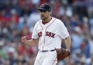 Boston Red Sox's Nathan Eovaldi reacts after striking out New York Yankees' Gleyber Torres to retire the side during the seventh inning of a baseball game in Boston, Saturday, Aug. 4, 2018. (AP Photo/Michael Dwyer)