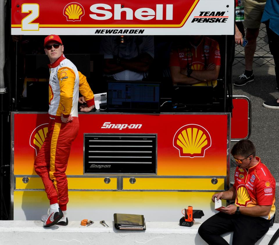 Team Penske driver Josef Newgarden stands by his pit box during practice for the 2023 Indy 500.