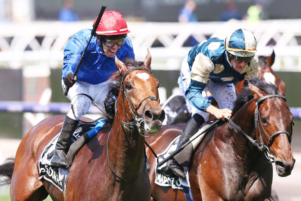 Kerrin McEvoy, left, guides Cross Counter to victory in the 2018 Melbourne Cup at Flemington. Source: Getty Images.