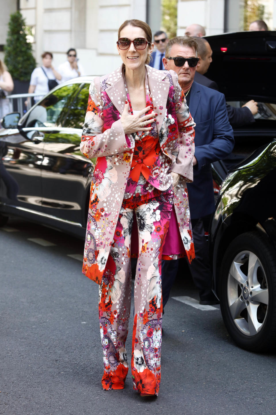 The Canadian star brought out all the florals when she left her Paris hotel on June 14, 2017 wearing a Roberto Cavalli suit. (Photo by Mehdi Taamallah/NurPhoto via Getty Images)