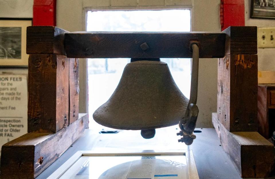 The bell from the Old College Heights School sits in the office of the College Heights Service Station, which is located across the street. Abby Drey/adrey@centredaily.com