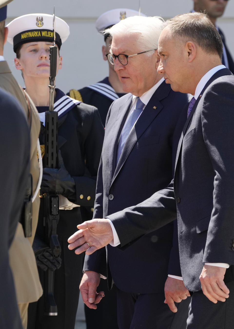 Germany's President Frank-Walter Steinmeier, front left, and his Polish host, President Andrzej Duda, front right, attend a military welcome ceremony at the Presidential Palace in Warsaw, Poland, Thursday, June 17, 2021 at the start of Steinmeier's brief visit marking 30 years of bilateral good-neighborly relations treaty. Their talks are expected to include the future of the European Union and its tran-Atlantic ties, the developments in Ukraine and Belarus and the divisive Nord Stream 2 gas pipeline between Russia and Germany. (AP Photo/Czarek Sokolowski)